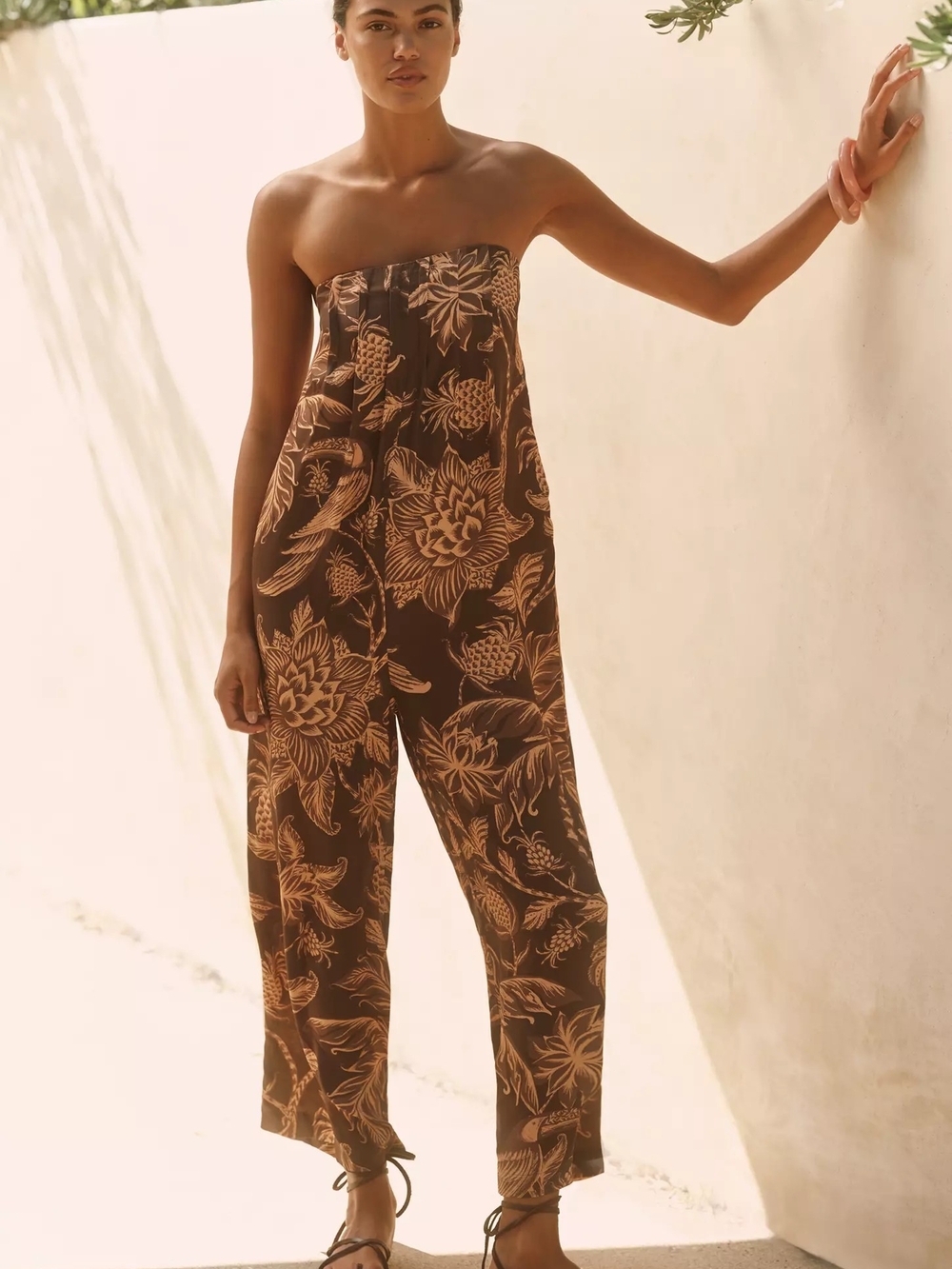 Anthropologie Farm Rio Strapless Floral-Print Jumpsuit in Brown And Orange